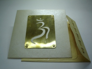 Brass greeting card with OM